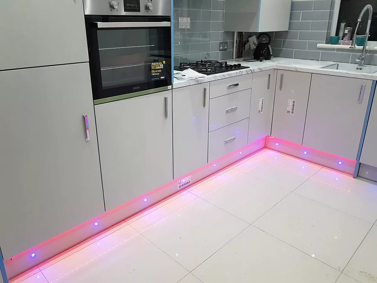 Professionally cleaned light-coloured hard floor with a polished finish